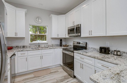 Port Malabar House | All new, lovely, spacious 3bd/2bth unit sleeps 8!