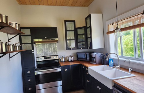 Kaladar House | All-season cozy pet-friendly country retreat on 24 acres; mins to trails & lakes