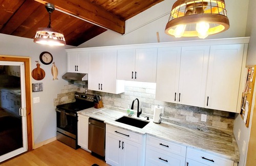 Chocorua House | All season vacation rental steps to Moores pond. Great for family sun and fun