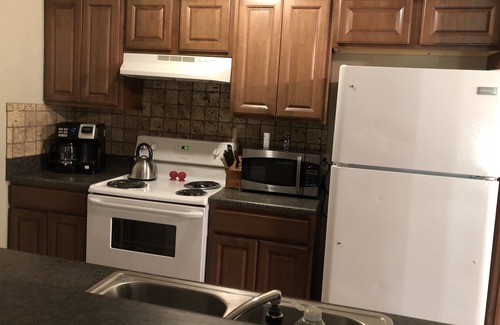 Elk City Condo | All the Comforts of Home Duplex. Backyard grill and atmosphere. Extra services!