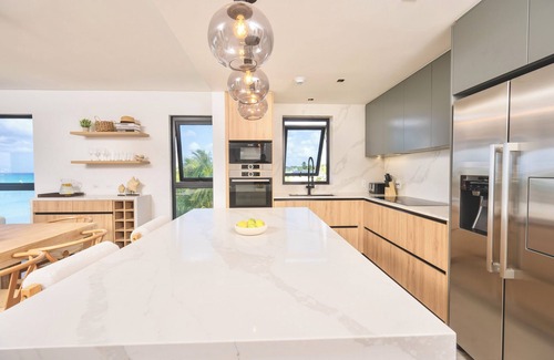 Brighton Condo | Allure 305: 3BDR Oceanfront Condo with Stunning Rooftop Pool & Beach Chairs
