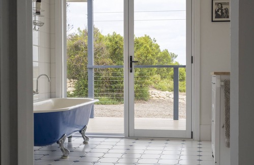 Pelican Lagoon House | Allure Beach Retreat - Privacy, Nature, Direct Beach Access