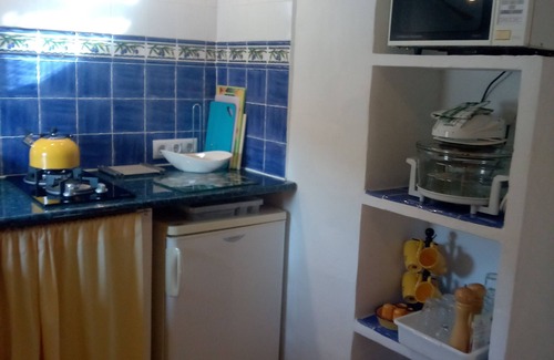 Los Alias Condo | Almond Reef Accommodation delightfully restored apartment, quiet, rural village.