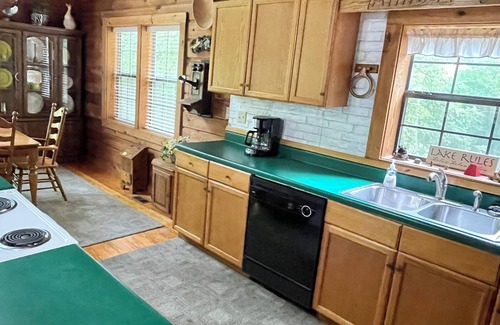Drasco Cabin | “Almost Heaven” a beautiful log cabin located in a lake and golfing resort!