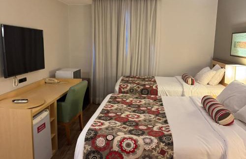 Setor Hoteleiro Norte Hotel | Alto Padrão - Cama Queen e Viuvão no Hotel Let's Idea