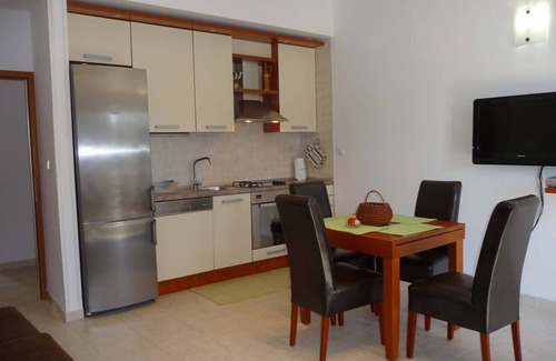 Veliki Drvenik Apartment | Amazing apartment with a gorgeous view, ten meters from the beach!