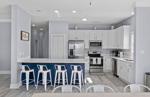 Cherry Grove Beach House | Amazing Channel Retreat Private Heated Pool Luxury Outdoor Living & Pet Friendly