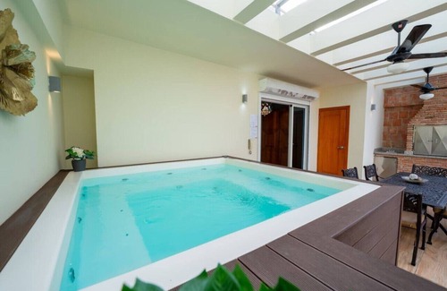 Renacimiento Apartment | Amazing condo + hot tub!