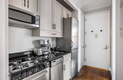 Ukrainian Village Apartment | Amazing East Village 2BR w/W/D, nr Groceries, by Blueground