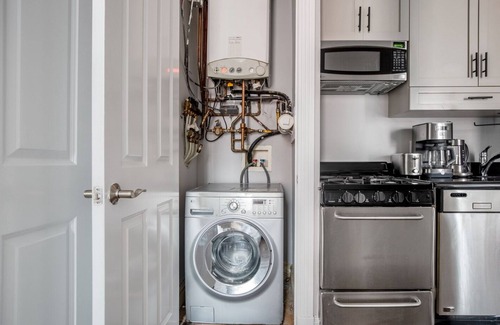 Ukrainian Village Apartment | Amazing East Village 2BR w/W/D, nr Groceries, by Blueground