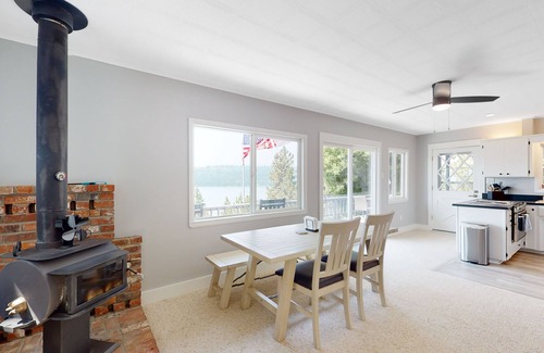 Harrison House | Amazing lake-view cabin with balcony, firepit, grill, wood stove, & W/D