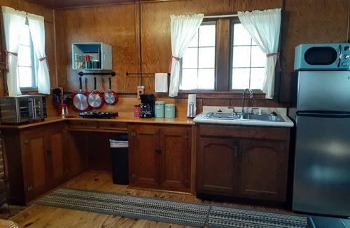 Broomfield Cabin | Amazing lakefront cabin with private beach, boat slip, kayaks, and pedal boat.