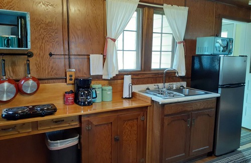 Broomfield Cabin | Amazing lakefront cabin with private beach, boat slip, kayaks, and pedal boat.