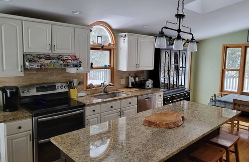 Marquette House | Amazing location across the street from the beach & bike path