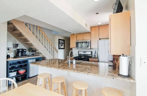 Boyne City Condo | AMAZING LOCATION! Condo in Heart of Downtown-Walk to Restaurants, Shops & Beach