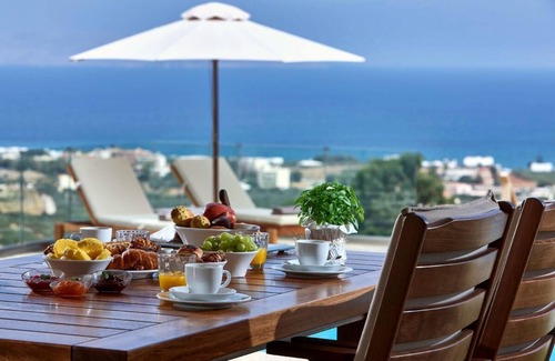 Vathianos Kampos Villa | Amazing location and views with a heated covered pool