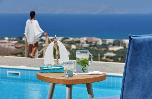 Vathianos Kampos Villa | Amazing location and views with a heated covered pool
