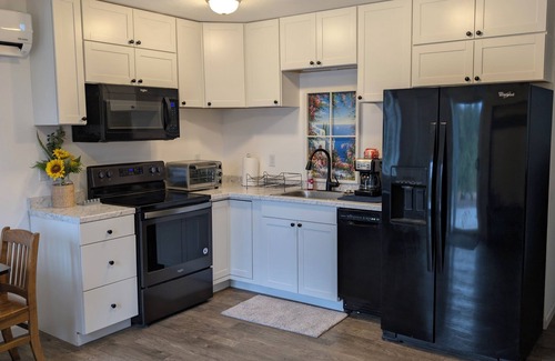 Coeur d'Alene House | AMAZING LOCATION-Close to Coeur D' Alene but settled in a wooded atmosphere.