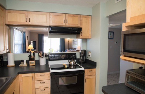New Smyrna Beach Condo | AMAZING OCEAN FRONT ~ Ground floor Walkout ~nCorner unit ~ No Drive Beach