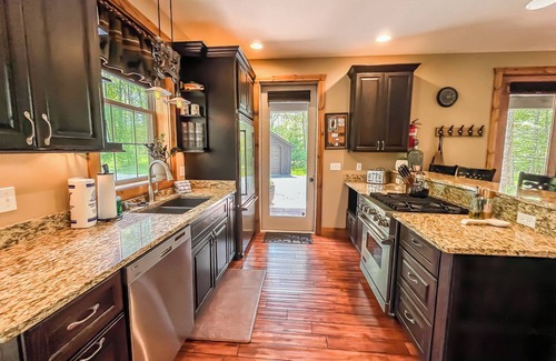 North Glade Hills House | Amazing Outdoor Space with Amenities Galore! Hot Tub, Fire Pit, and More!