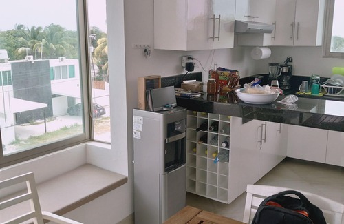 Chicxulub Puerto Apartment | Amazing Sunsets, breeze and Sea View from Bdr and Living room