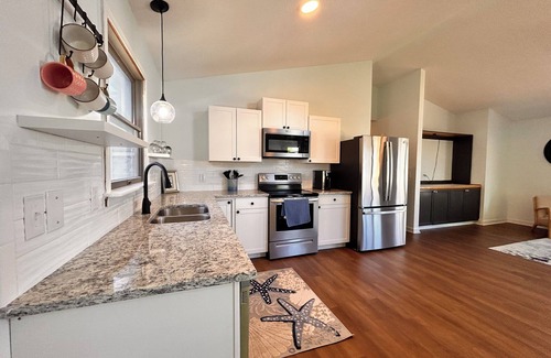 Colington Harbour House | Amazing sunsets, hot tub, community pool, 3 bed 2 bath. Dog friendly!