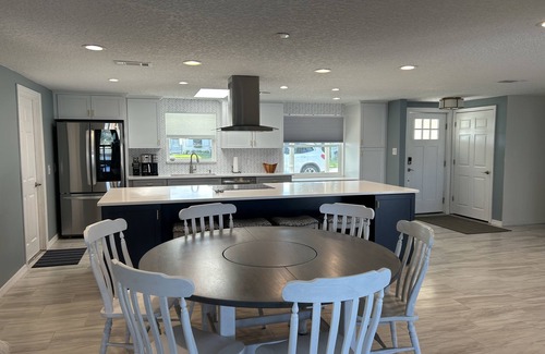 Spring Hill House | Amazing views, Dolphins, And Sunsets!nnWaterfront property with pool and dock.