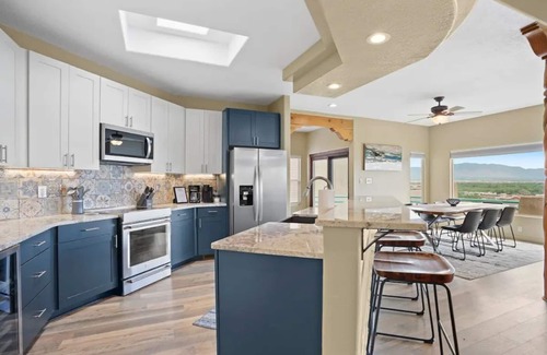 Taylor Ranch House | Amazing views of the mountains and city with game room and putting green!