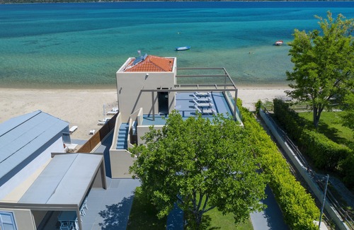 Vourvourou Villa | Amazing villa right on the beach feet in the water