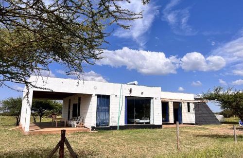 Oloitoktok House | Amboseli Glass house