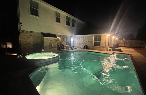 Champion Forest House | AMHOT - in Houston with heated pool spa