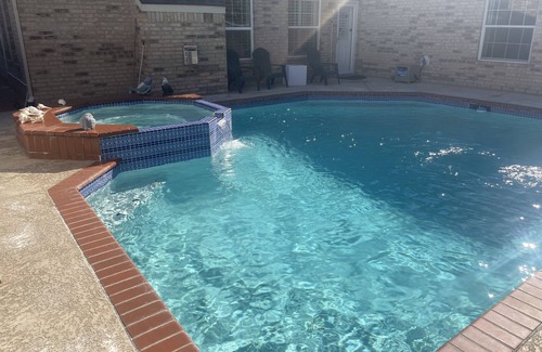 Champion Forest House | AMHOT - in Houston with heated pool spa