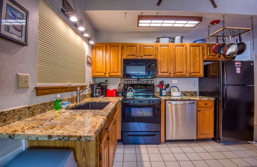 Bartlett Resort | AMV 2 bedroom condo right across from the outdoor pool sleeps 7