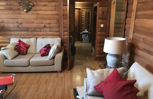 Portsonachan House | An Amazing Cedar 3 Bedroom Lodge On The Lochside at Portsonachan
