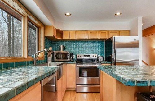 Birchwood Ski Chalet | An Iconic Private Retreat on Beautiful Red Cedar Lake