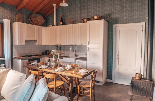 Levo House | An oasis in the middle of nature: Tastefully furnished 3-room stone house with swimming pond