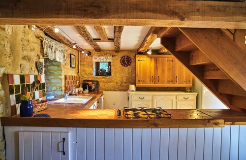 Daglan Cottage | An old stone cottage full of rustic charm with pool and stunning views