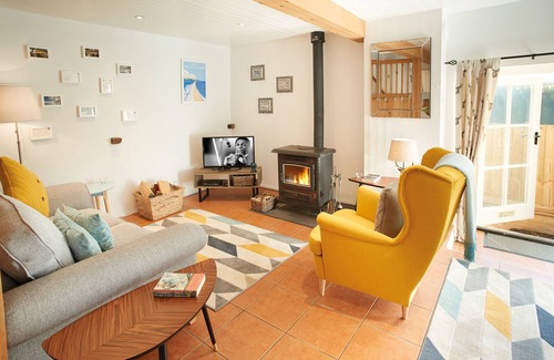 Ash Mill Cottage | An open plan cottage with a private patio with views of the countryside.