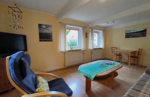 Handewitt Apartment | Andresen - Ferienwohnung mit Gartenlaube