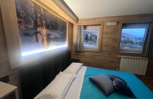 Passo del Tonale House | Anemone Bianco Suite Rooms