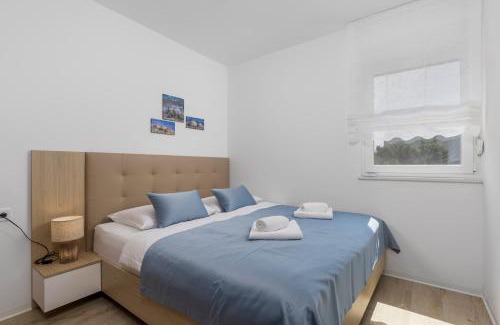 Kolan Apartment | Angelika's white blue holiday home