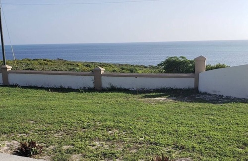 Cockburn Town Villa | Anglor@ Breezy Brae-Ocean View 2/2 bed and bath-minutes from the beach.