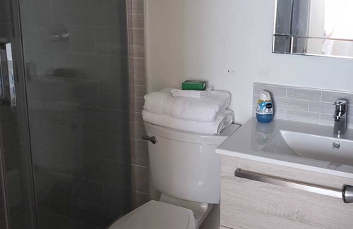 Cockburn Town Villa | Anglor@ Breezy Brae-Ocean View 2/2 bed and bath-minutes from the beach.