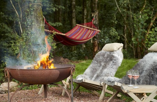 Tintern Cabin | Anne's Hut offers a romantic retreat for two in two interlinked shepherd's huts with decking area an