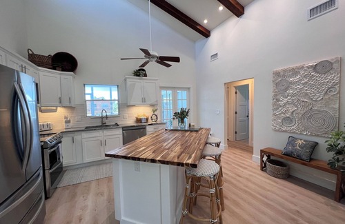 Bokeelia House | Antigua Cay Retreat is a stylish home with pool on deep water canal in Bokeelia
