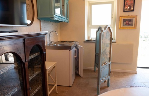 Ottiglio Apartment | Antique Treasures Suite