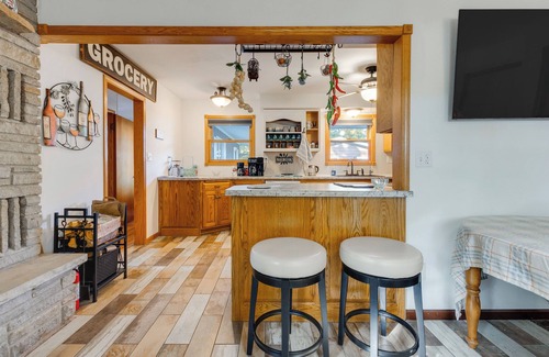 Waupaca House | Antiquing & Fishing: Riverfront Waupaca Home!