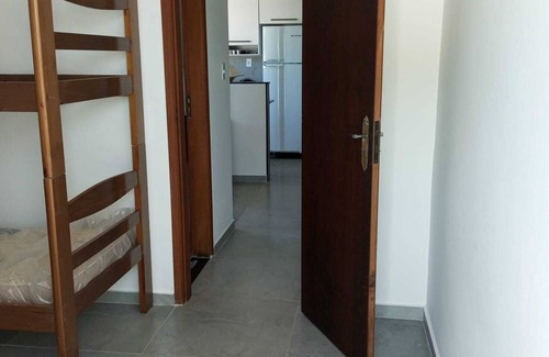 Praia Grande RV Rental | AP Próximo a Praia Apenas 50 Metros