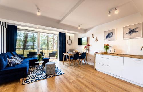 Poddabie Apartment | Apartament 21B Niebieskie Apartamenty Poddąbie z basenem krytym, odkrytym, salą zabaw, animacjami