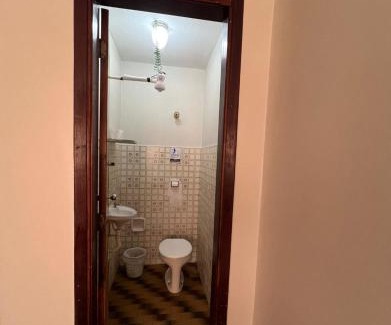 Patos de Minas Apartment | Apartamento 104 - Suíte econômica com ventilador